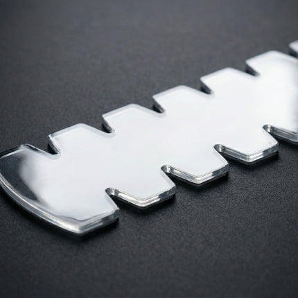 Macro view of Courterra 0.7mm thick transparent TPU padel protector showing smooth texture and heavy-duty impact resistant material.